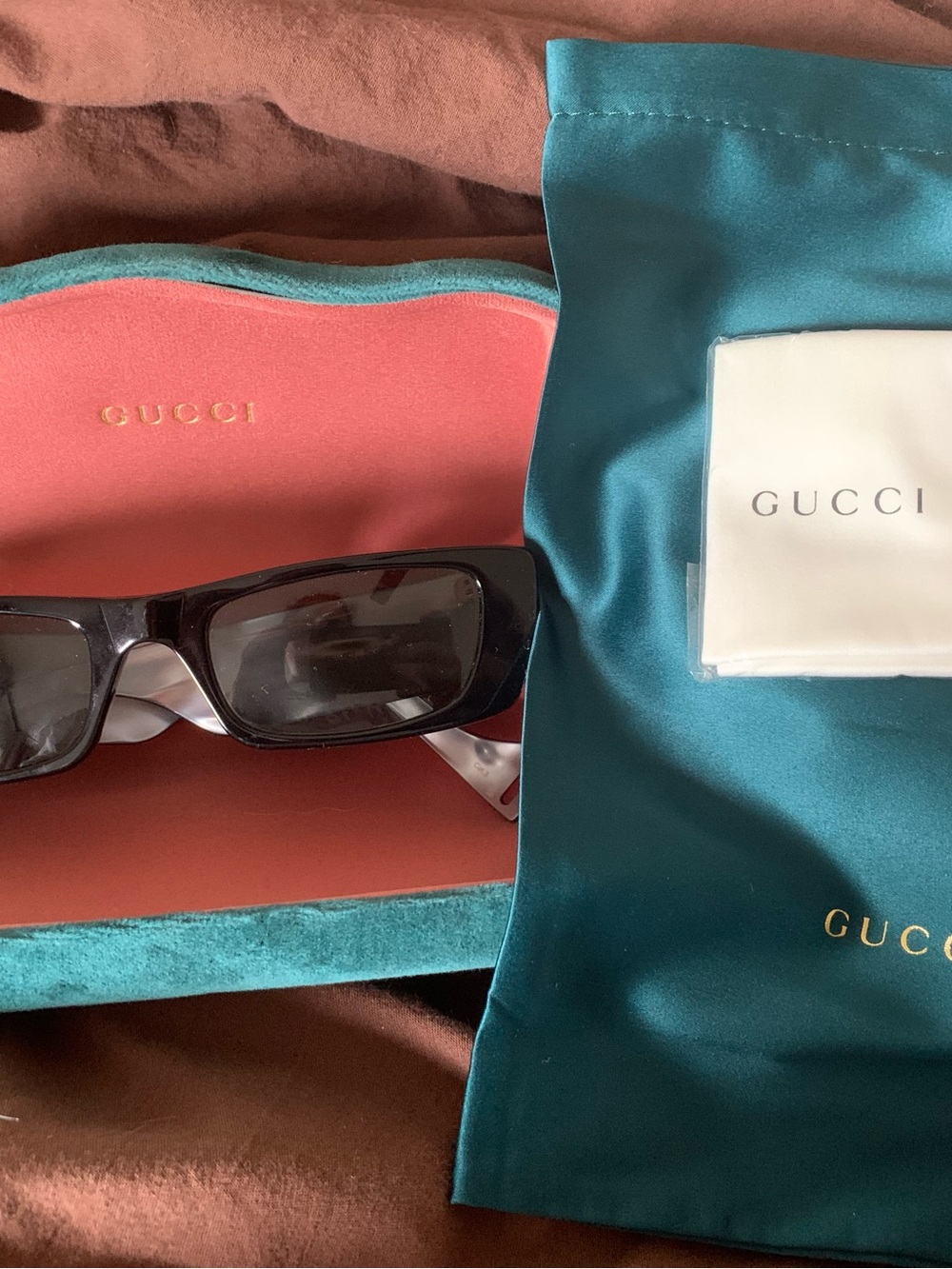 Gucci Black Rectangular Sunglasses with Teal Case Interior